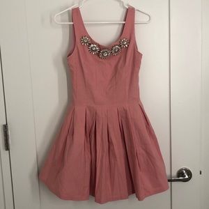 Pink dress with tulle skirt and jeweled neckline